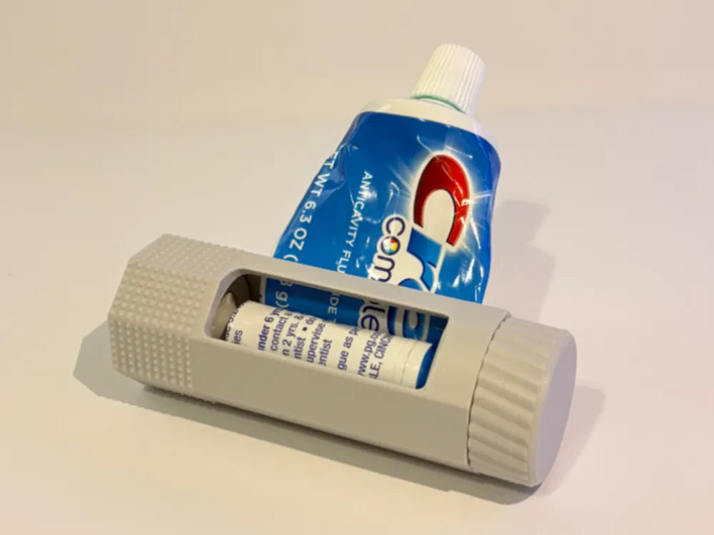 presse tube a dentifrice